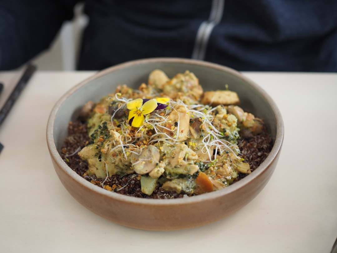 Plant-based bowl with sliced vegetables and grains